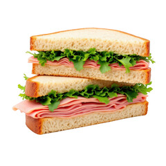 A sandwich with layers of sliced ham and fresh leafy lettuce between two slices of bread.