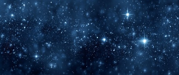 Obraz premium A panoramic view of the starry night sky with numerous stars shining brightly against a dark blue background.