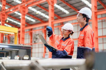 Fototapeta premium Team of engineers are working in factory.