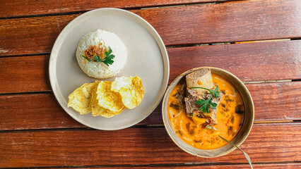 Vibrant Serving of Rice with Spicy Vegetables and Protein