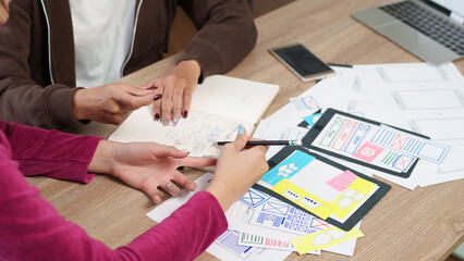 UI UX Designers Brainstorming User Interface Ideas for Mobile App Design Development Innovative Design Process Adult Women