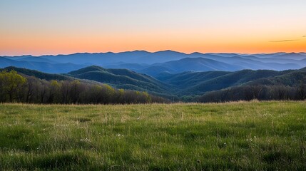 Peaceful mountain range during golden hour with a clear sky