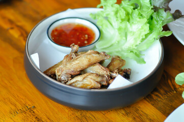 chicken wings or deep fried chicken , fried chicken and sauce