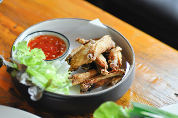 chicken wings or deep fried chicken , fried chicken and sauce