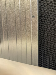 Aluminum surface. Silver and gold metal sheet floor.