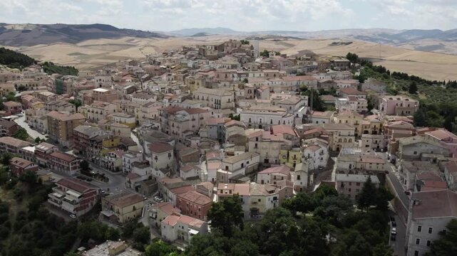 Drone over old historic European city in the mountains on a cloudy day