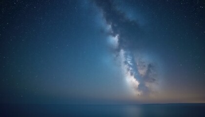 Obraz premium Starry Nightscape: Milky Way Galaxy Shimmers Over Tranquil Ocean, a Stunning Astronomy Landscape