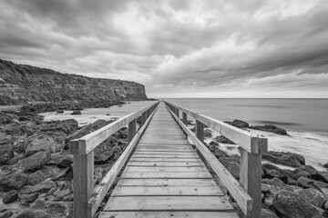 Exploring the Adelaide coastline with a wooden boardwalk leading to rocky shores under dramatic clouds, Adelaide coastline sightseeing Travel and explore Rapid Bay Jetty site