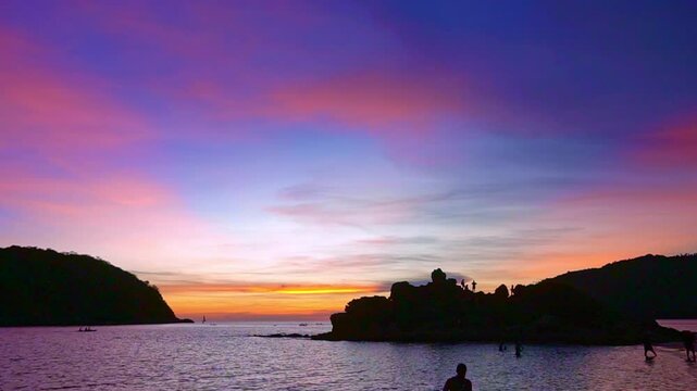 stunning sunset above the island in front Yanui beach.
Yanui beach is in the middle of windtubind viewpoint and Promthep cape
small island in front of Yanui beach.
creative nature and travel concept