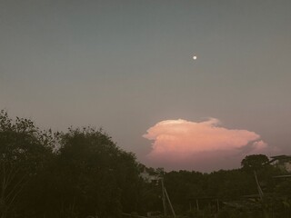 time lapse of clouds over sunset