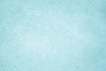 Pastel blue and white concrete stone texture for background in summer wallpaper. Cement and sand wall of tone vintage. Concrete abstract wall of light cyan color, cement texture mint green for design.