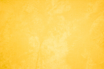 Yellow concrete stone texture for background in summer wallpaper. Cement and sand wall of tone vintage minimal. Concrete abstract wall of light yellow color, cement texture white blank for home decor.