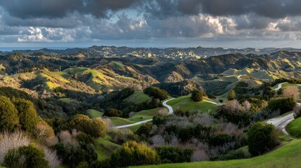 over green hills with patches of sunlight breaking through