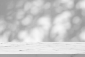 Marble table with tree shadow drop on white wall background for mockup product display