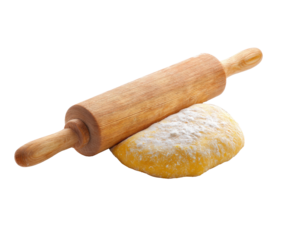 Baking dough with rolling pin on kitchen counter for homemade treats
