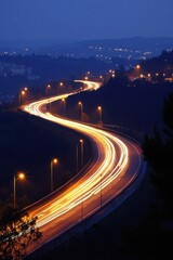 Curving Highway at Night with Light Trails from Cars and Streetlights in a Dark Environment Long Exposure Shot
