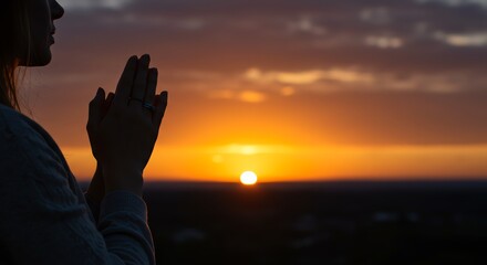 Woman in Prayer at Sunset