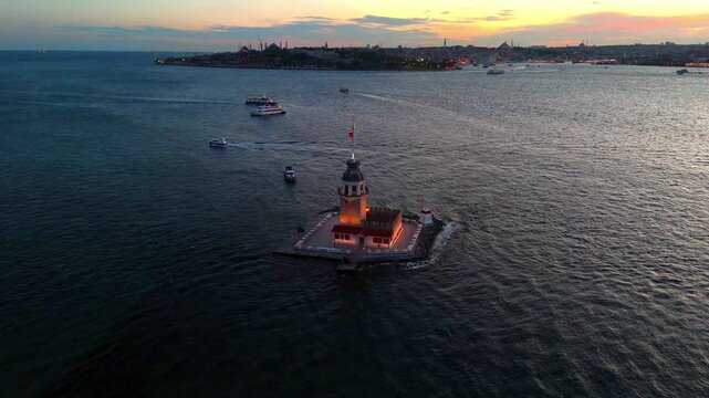 Stunning Aerial 4k ultra hd video of Maiden's Tower at Sunset in Istanbul.A breathtaking aerial view of the Kiz Kulesi (Leander's Tower) in istanbul, Turkey, at sunset. Turkiye Uskudar touristic sunny
