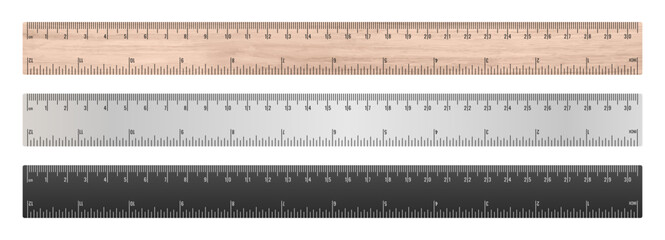 School rulers in centimeters. Set of three rulers isolated on a white background. Wooden ruler with inch and centimeter markings