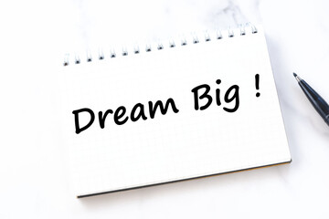 Dream Big, text words typography written on notebook, life and business motivational inspirational concept
