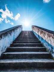 Obraz premium Stairway leading up to bright sun against blue sky low angle shot in outdoor setting for success concept