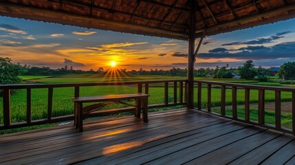 Scenic rice field view from eco-luxury resort villa balcony at dawn
