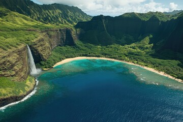 Lush Hawaiian valley with waterfall cascading into turquoise bay