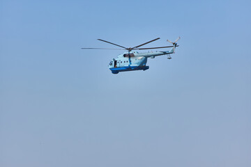 Mil Mi-8 Helicopter in Flight Blue Sky