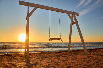 Golden Hour Swing on the Beach