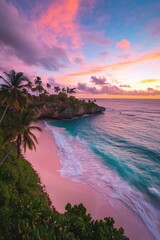Sunset over a tropical beach. Lush greenery surrounds a pristine beach