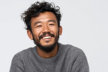 Fototapeta premium Portrait of an Asian man with a joyful expression