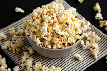 Homemade Butter Popcorn with Salt in a Bowl, side view.