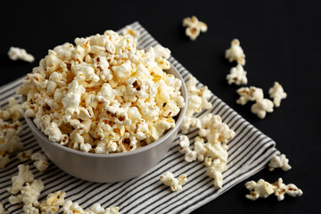 Homemade Butter Popcorn with Salt in a Bowl, side view.