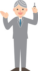 鍵を持つスーツの男性