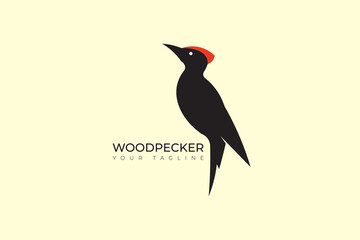 Woodpecker abstract silhouette logo, minimalist woodpecker logo design