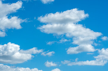 White clouds in blue sky.
