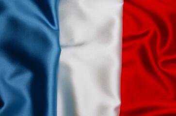 Fototapeta premium Flag of France on satin texture
