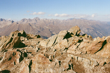 Dombay. Mountain landscapes against the background of a clear sky on a film camera. Tourism and...