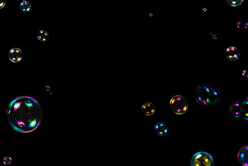 Soap bubbles isolated on a black background