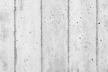 Concrete wall texture showcasing industrial design and urban aesthetics in monochrome tones