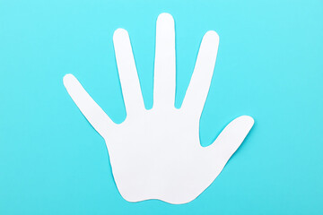 Fototapeta premium two hands reaching out to each other on a blue background
