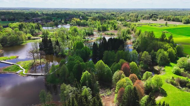 Kirkilai, Biržai Regional Park, Lithuania - A Scenic Area of Karst Lakes, Forests, and a Canoe-shaped Tower - Aerial Drone Shot