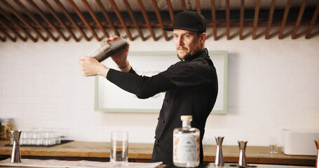Cocktail, cafe and bartender man with shaker, glass and tools for artisan beverage recipe....