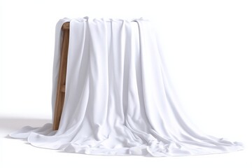 Fototapeta premium Clean white fabric draped elegantly over a simple wooden stool against a bright white background. A minimalist image perfect for various uses.