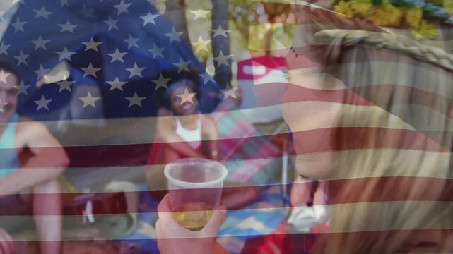 Friends sitting at campsite holding plastic cups in grassy clearing, with animated marketing icons