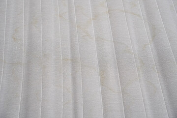 close up. an old gray spring mattress