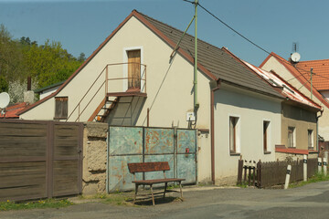 Entrance to private property or a courtyard. A gate house within a residential development in...