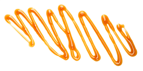 Delicious Caramel Sauce Drizzle Isolated on Black Background