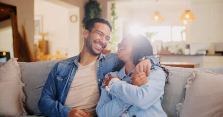 Laugh, couple and hug on sofa for love, relax and bonding together on weekend. Embrace, happy man...