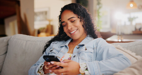 Sofa, woman and laughing with smartphone for chat, online joke and connection with contact. Home,...